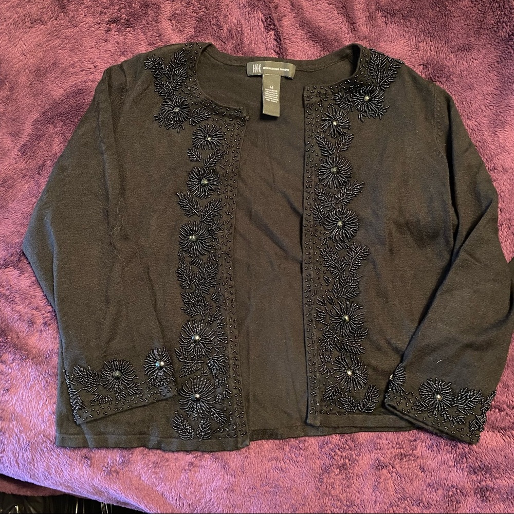 INC statement sweater